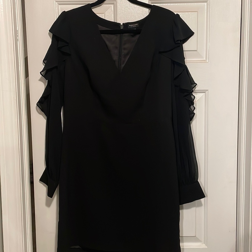 Black mini dress with sheer ruffled sleeves